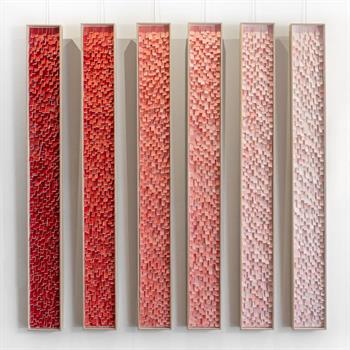 a series of 6 framed paper collage artworks in shades of red