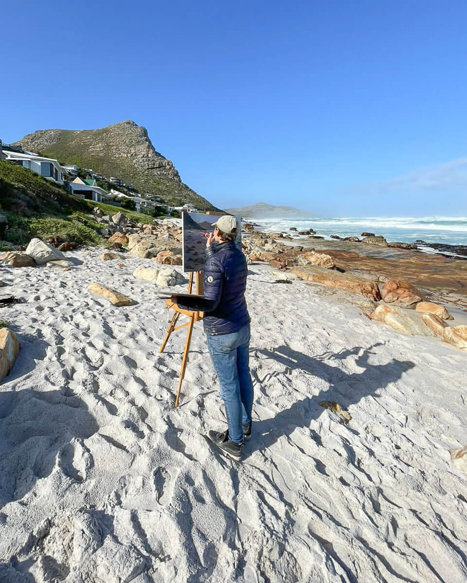 Joanna Lee Miller painting plein air on the beach