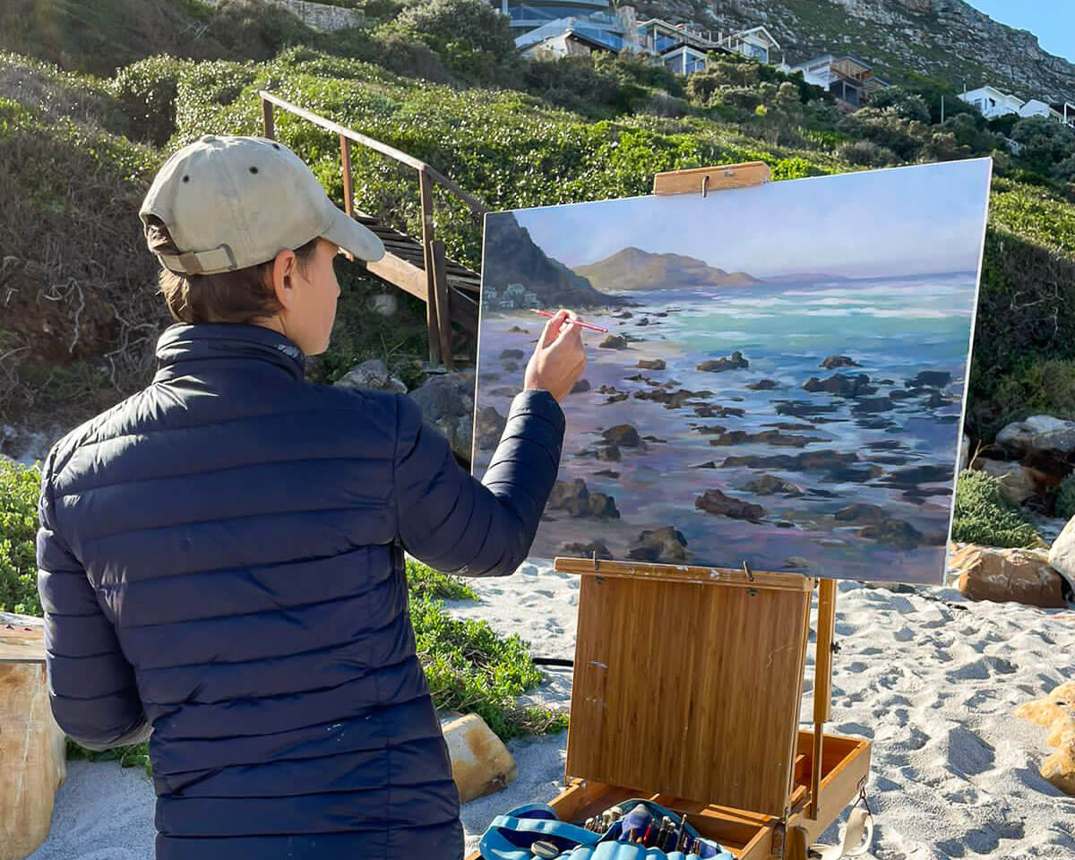 Joanna Lee Miller painting a beach landscapeplein air