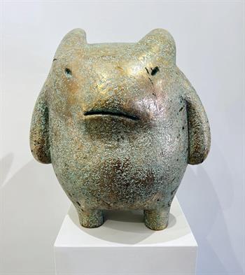 Large bronze playful sculpture that celebrates the courage it takes to embrace vulnerability.