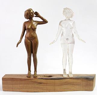 bronze sculpture of two women talking to each other