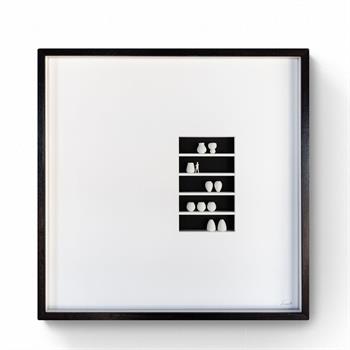 3d printed artwork of miniature people in black frame