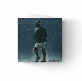 small painting on wood of an African man wearing shorts