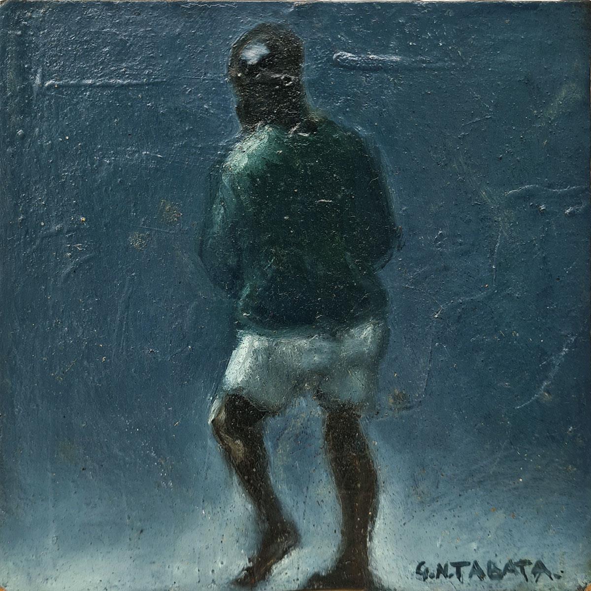 small painting on wood of an African man wearing shorts