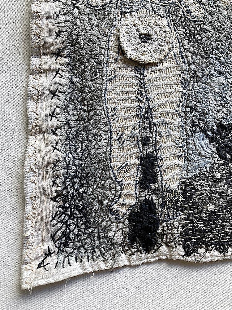 hand stitched artwork on domestic textile and lace