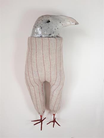 small fabric and ceramic bird sculpture