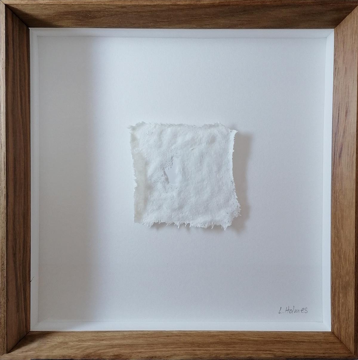 framed piece of white porcelain clay