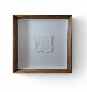 framed piece of white porcelain clay