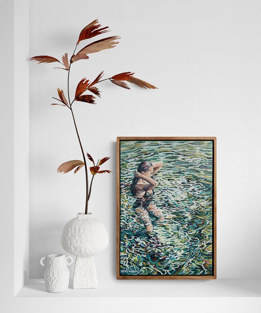 small framed painting of a young woman swimming