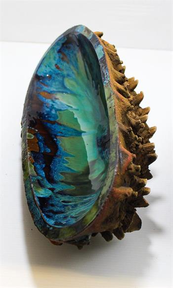sculptural ceramic with blue glaze