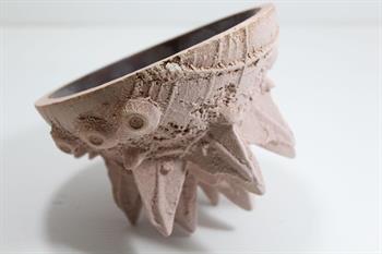 sculptural pink sand cast ceramic with gold glaze