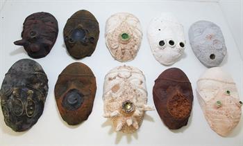 wall installation of ceramic masks