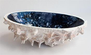 white earthenware ceramic with blue glaze