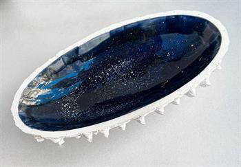 white earthenware ceramic with blue glaze