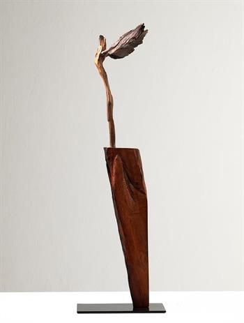 teak sculpture inspired by an eagle and mythology