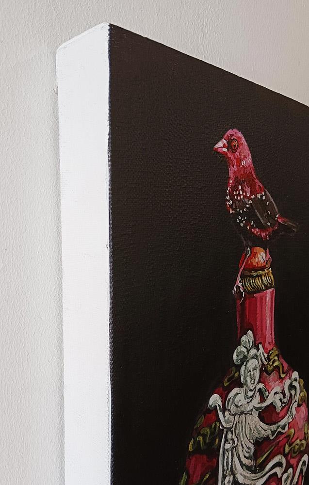 painting of a small red bird perched on an ornate vase