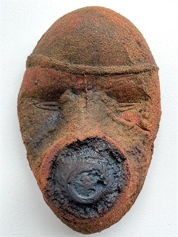 tribal mask created from sand cast terracota