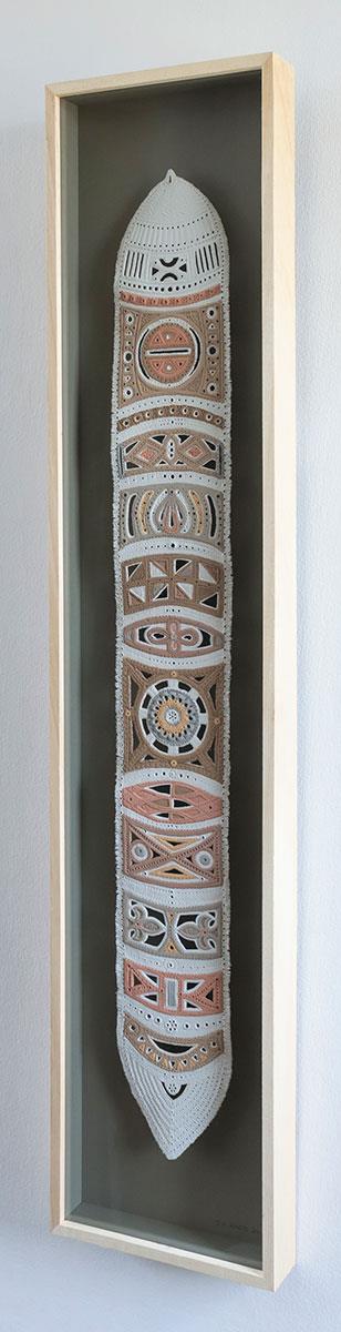 framed natural stone clay wall sculpture with African tribal design