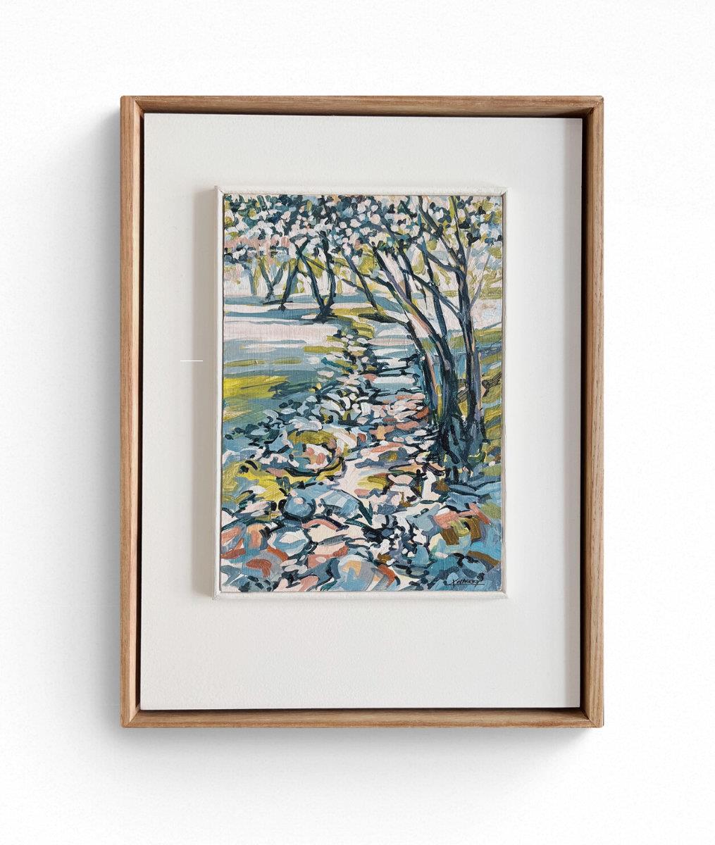 small framed painting of trees in a forest landscape