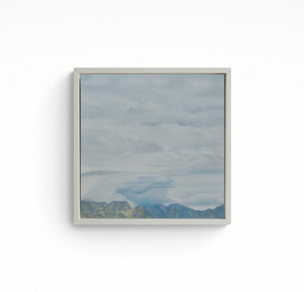 small painting of fluffy white clouds above the mountain tops