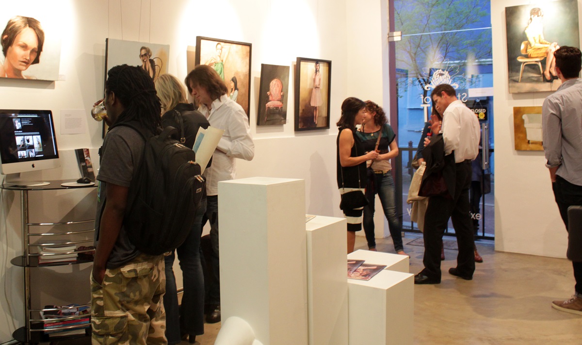 Visitors to StateoftheART gallery in Cape Town enjoy an exhibition by Mila Posthumus